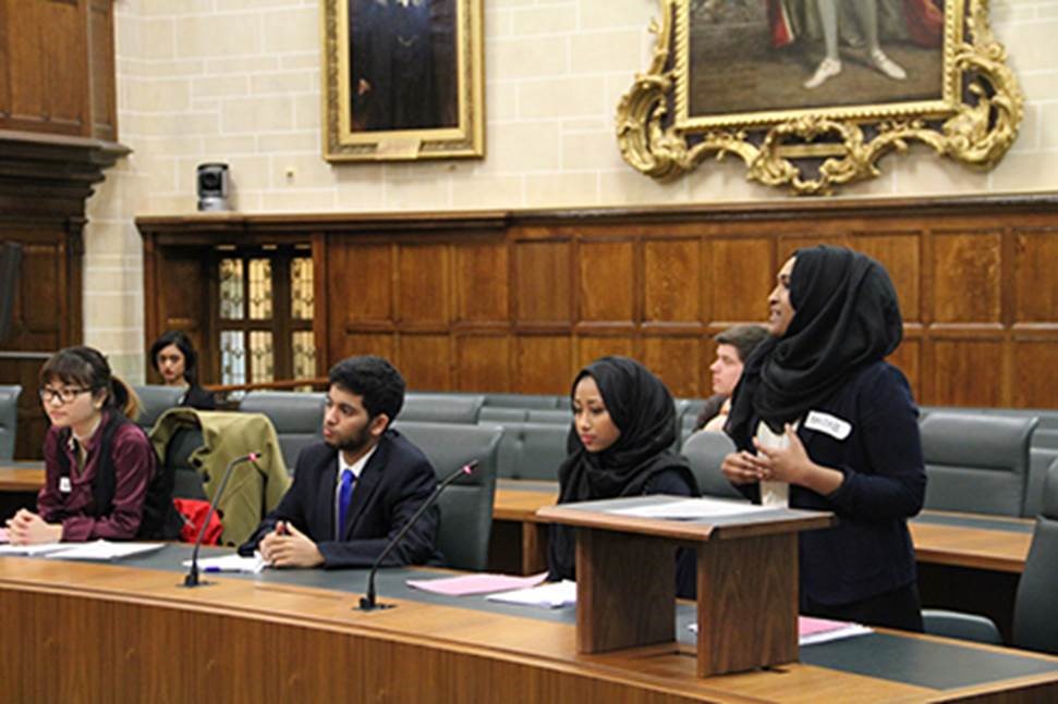 Students debating in the JCPC